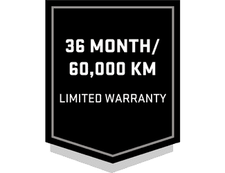 Black warranty badge displaying "36 Month/60,000 KM Limited Warranty," emphasizing the duration and distance coverage for vehicle protection.