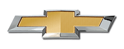 Chevrolet logo featuring a gold bowtie design outlined in chrome, symbolizing the brand's automotive heritage and commitment to excellence.