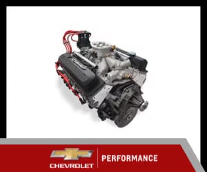 Chevrolet performance engine showcasing advanced design features, ideal for high-performance vehicles, with visible ignition wires and manifold, set against a clean background.