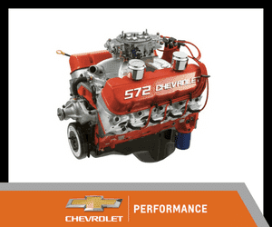 Chevrolet 572 performance engine showcasing a powerful design with red accents, featuring multiple carburetors and polished details, ideal for high-performance vehicles.