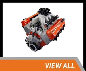 High-performance 632 cubic inch engine with a bright orange and silver design, showcasing advanced engineering for automotive enthusiasts.