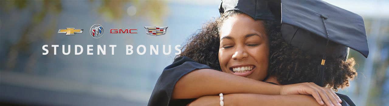 Two happy graduates in caps and gowns embrace, celebrating their achievement. The text "STUDENT BONUS" is displayed prominently beside them, highlighting a promotion or benefit for students.