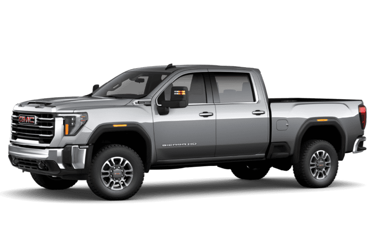 GMC Sierra HD 2023 model in silver, showcasing a powerful and rugged design with a spacious crew cab and enhanced towing capabilities, ideal for heavy-duty work and off-road adventures.