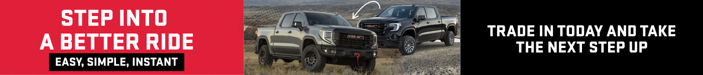 Promotional banner for GMC, featuring a white pickup truck with bold text encouraging customers to inquire about tariff-free pricing and to trade or sell their vehicles.